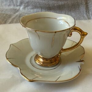 Vintage porcelain white & gold floral & leaf design demitasse cup & saucer set